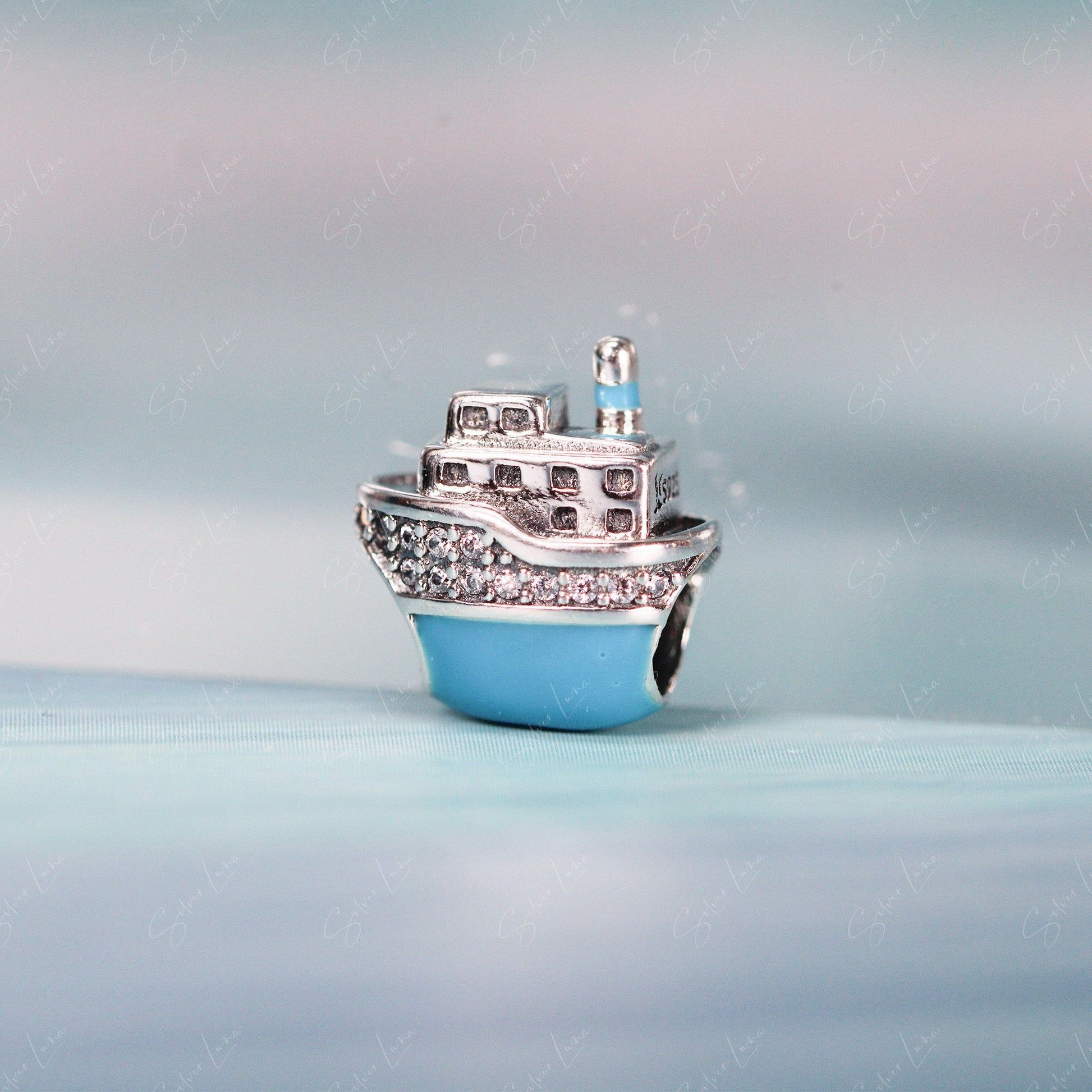 blue ship charm