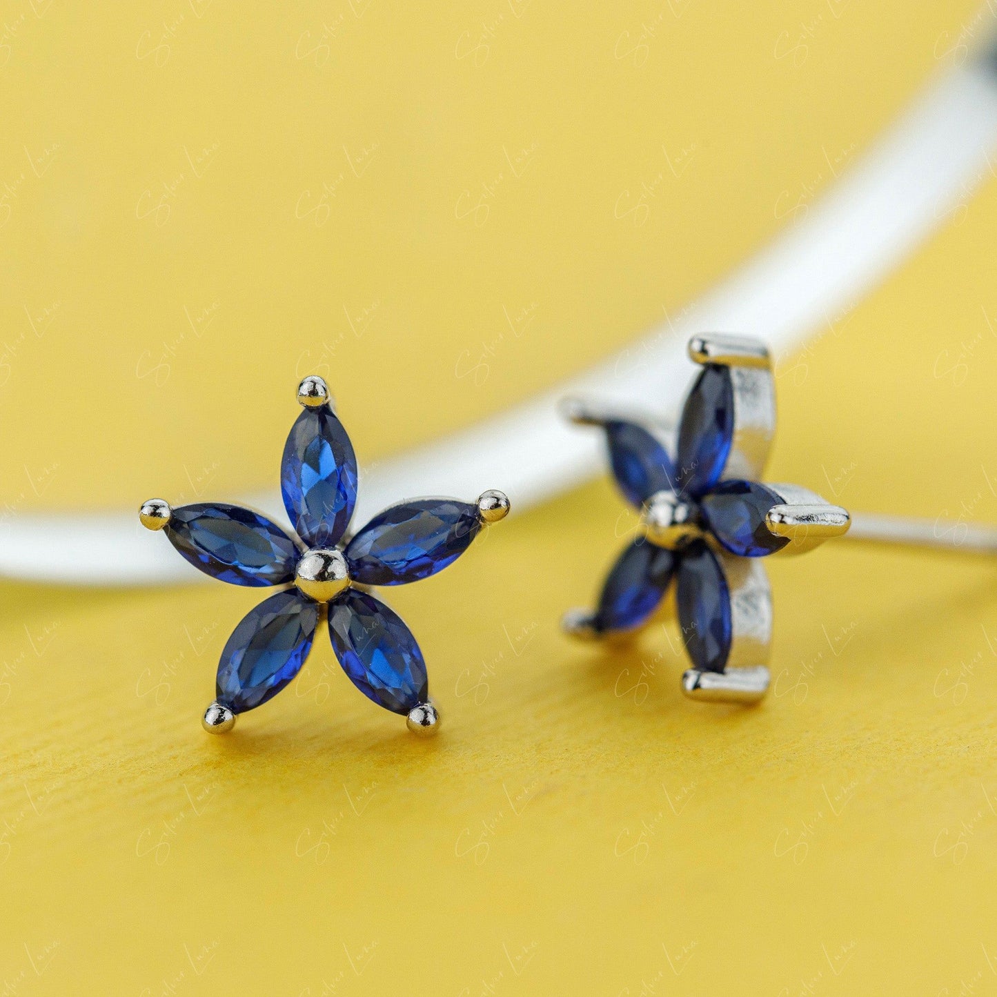 Cubic zirconia flower sterling silver stud earrings