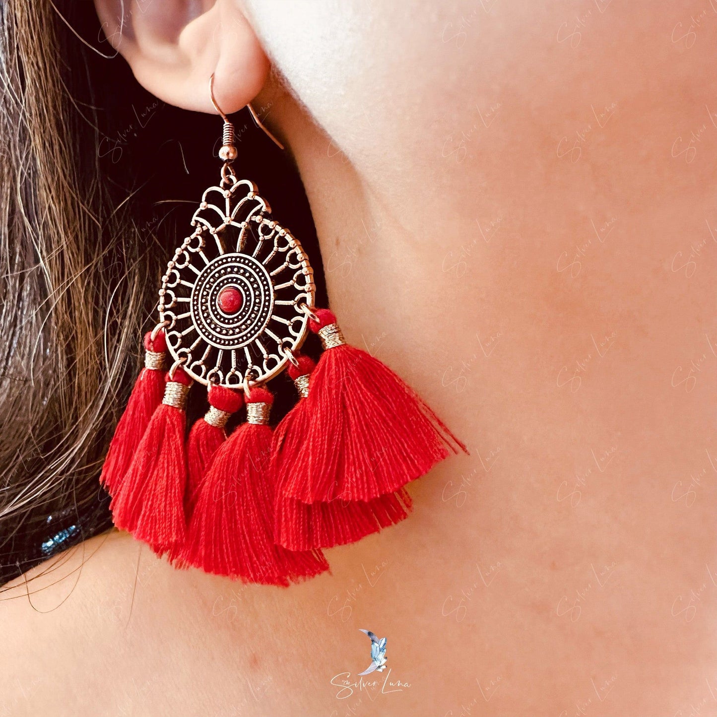 Red fan tassel statement earrings