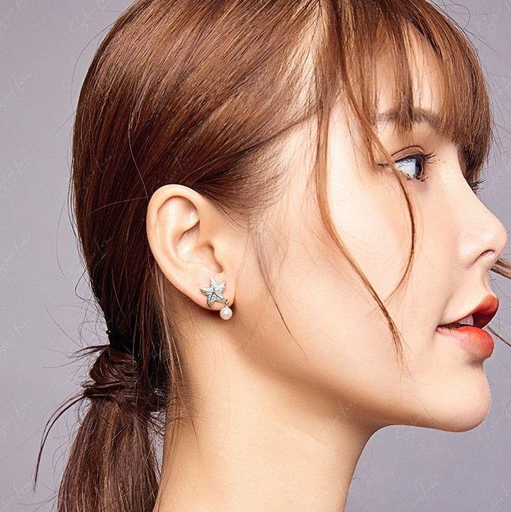 Blue starfish pearl drop sterling silver earrings