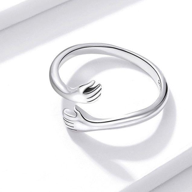 hugging hand adjustable ring