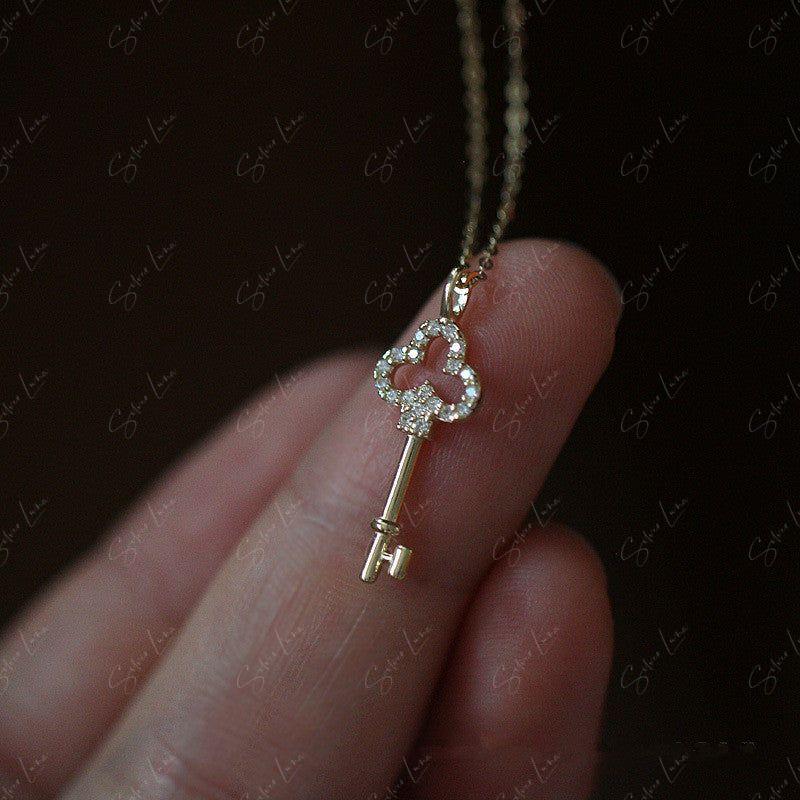 Dainty key pendant necklace in sterling silver