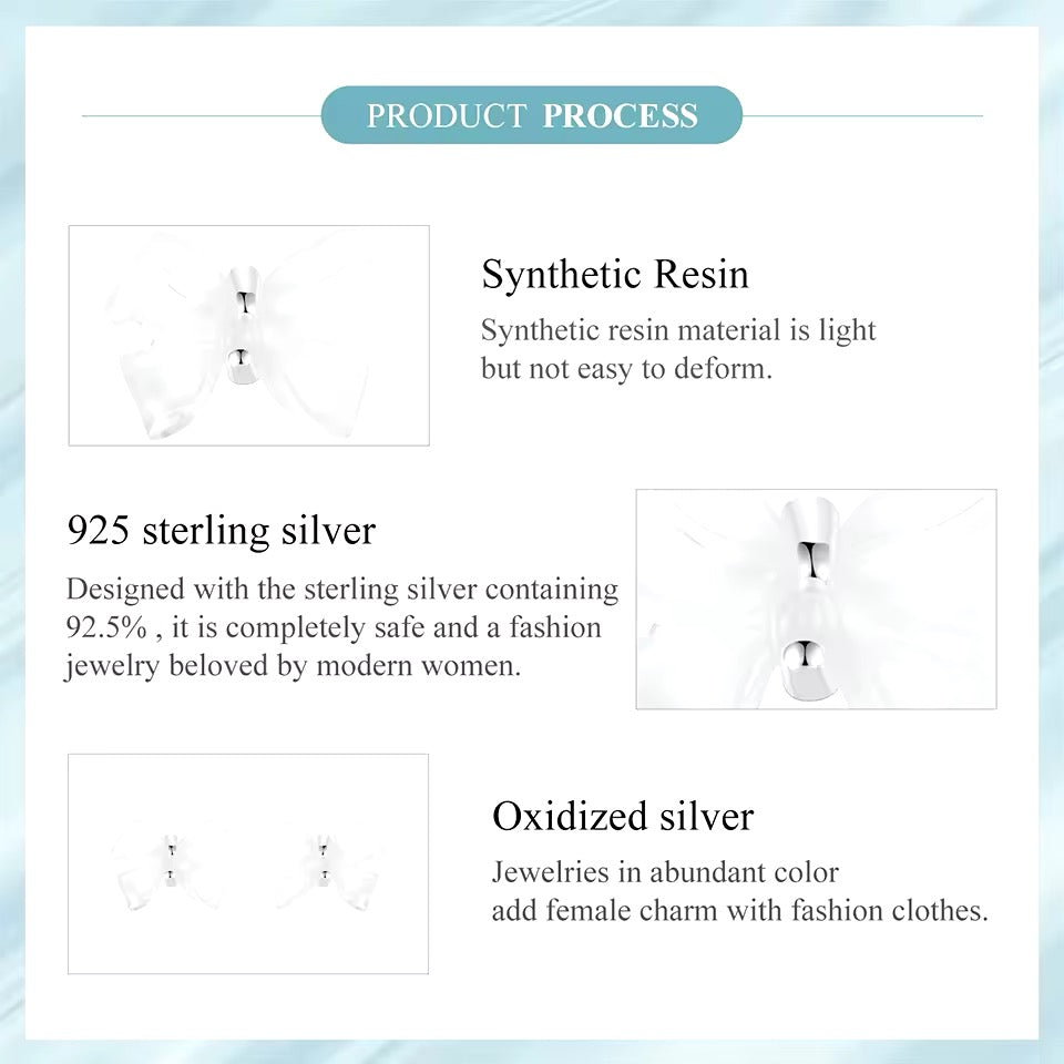 Resin bowtie sterling silver stud earrings