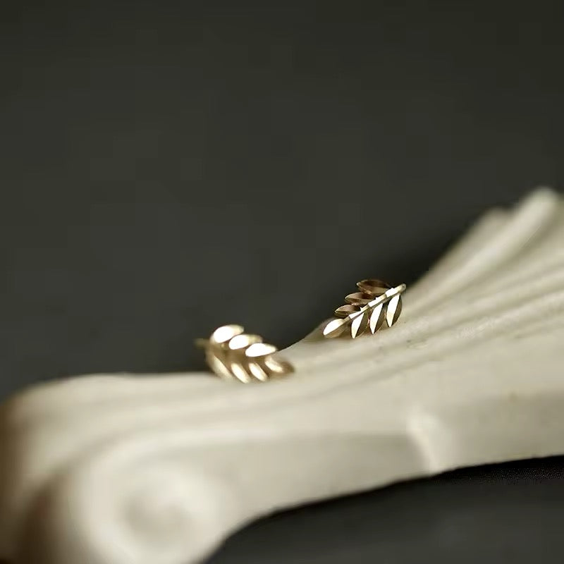 dainty gold leaves stud earrings