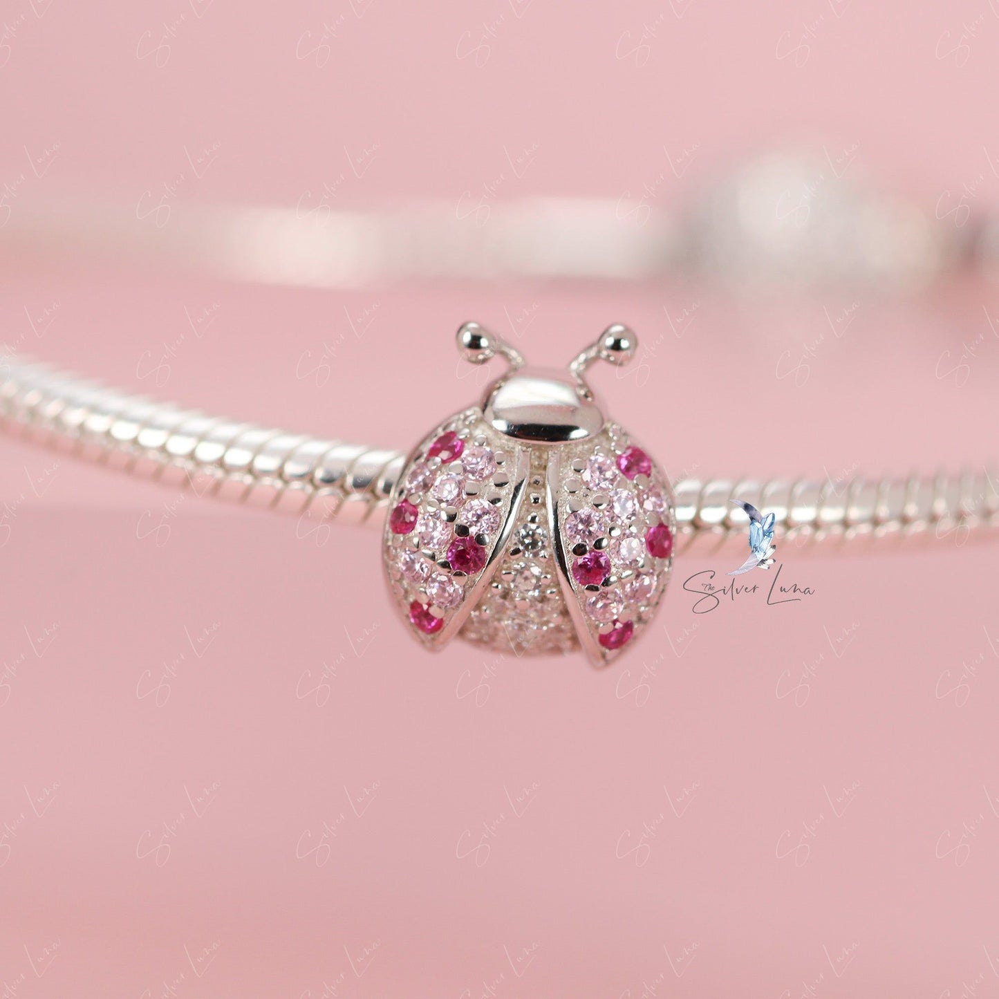 silver ladybug charm