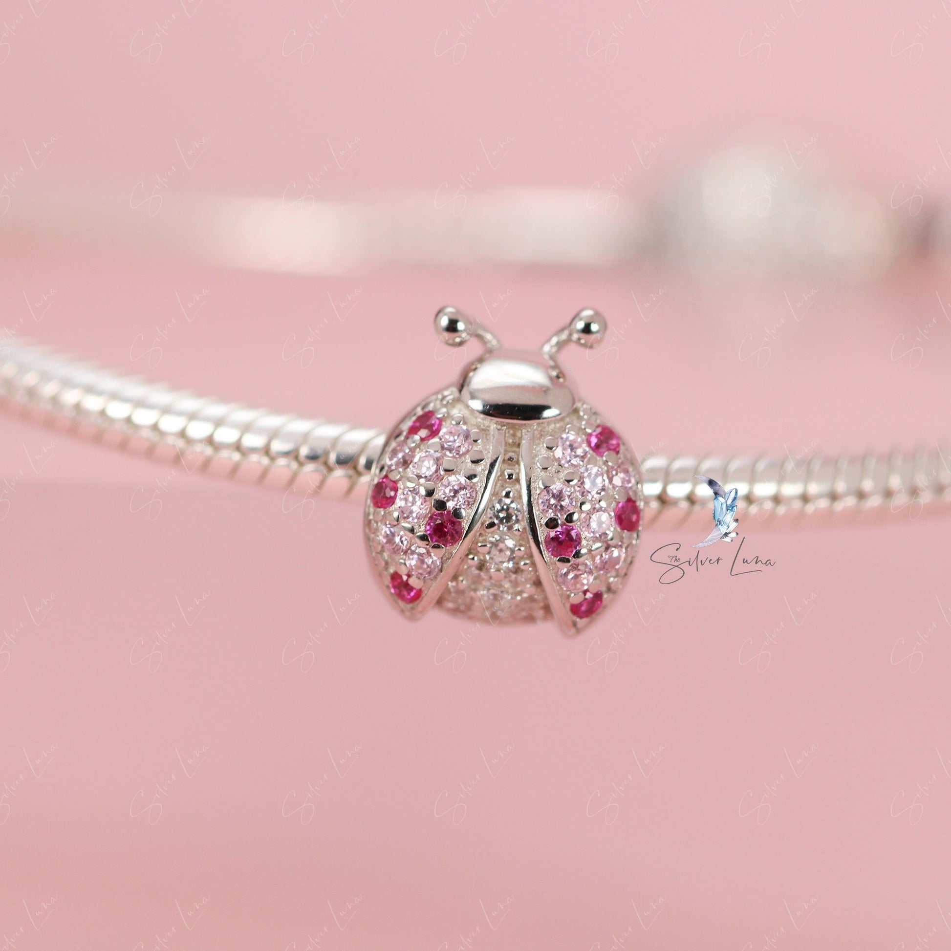 silver ladybug charm