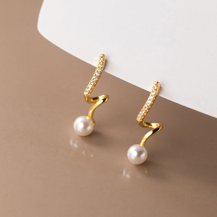 Wavy pearl sterling silver stud earrings
