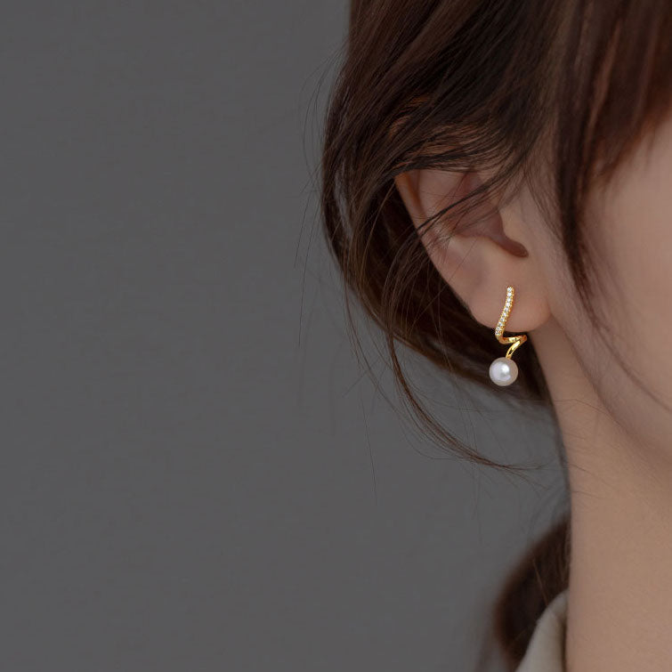 Wavy pearl sterling silver stud earrings