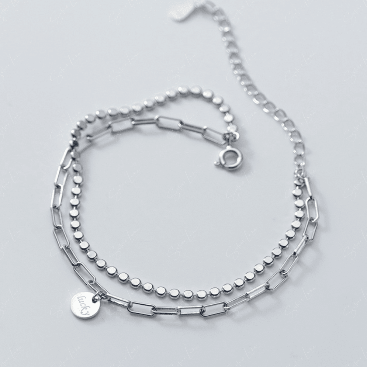 Lucky charm double layer bracelet in sterling silver