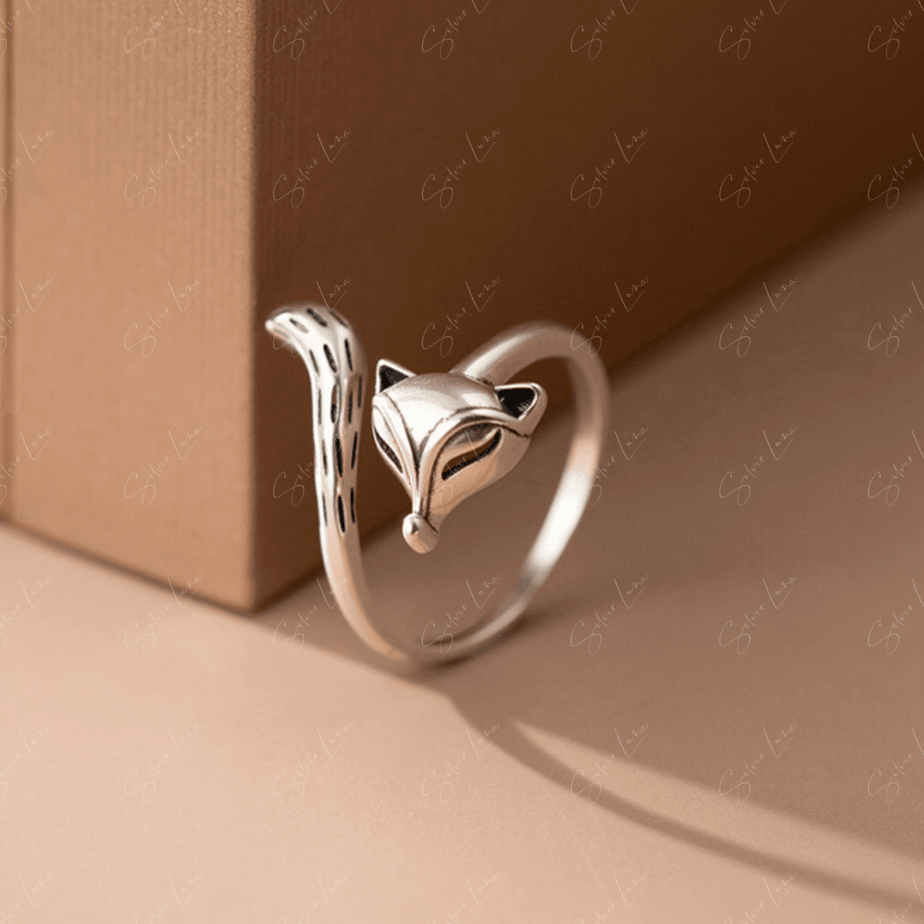 Silver fox wrap adjustable ring