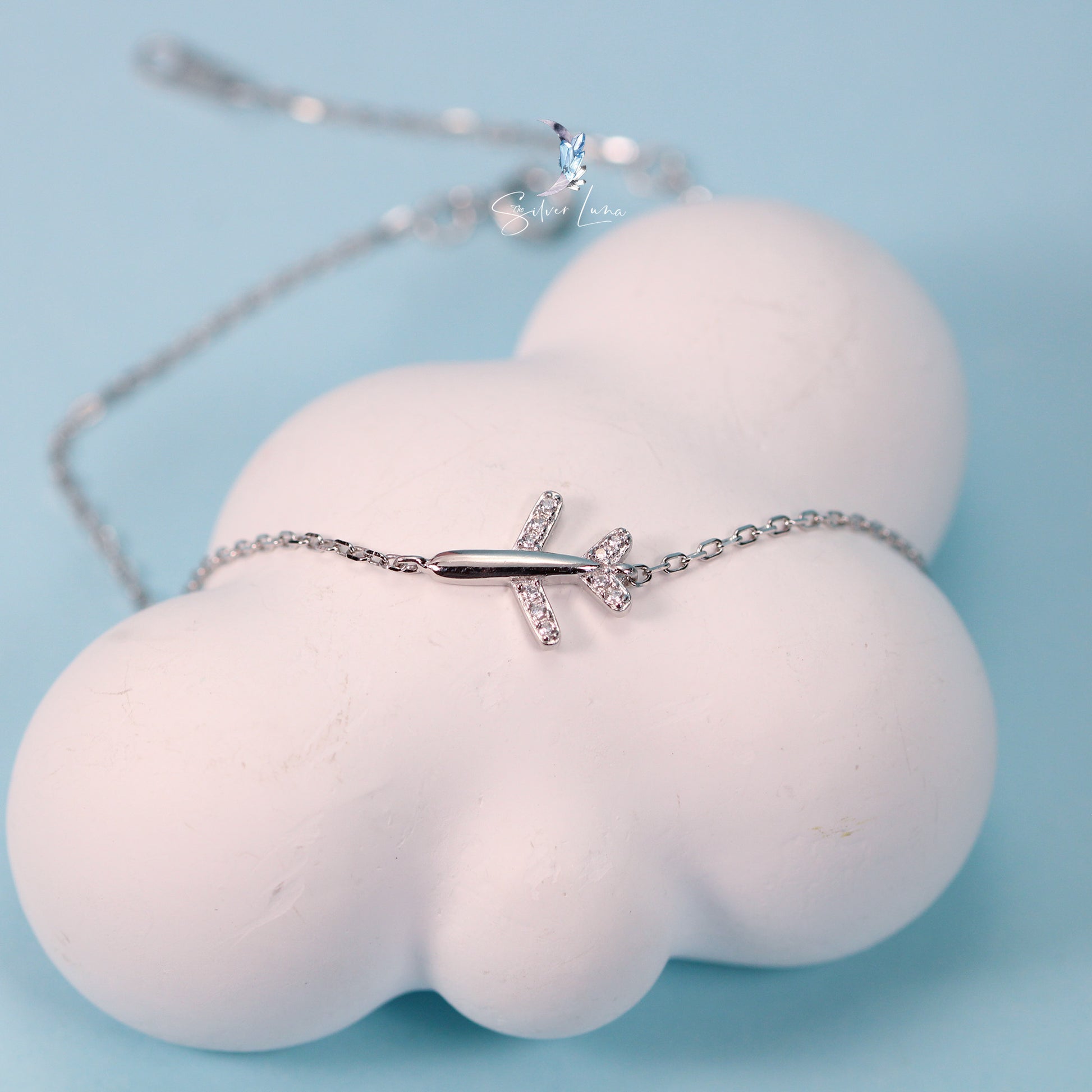minimalist airplane silver bracelet