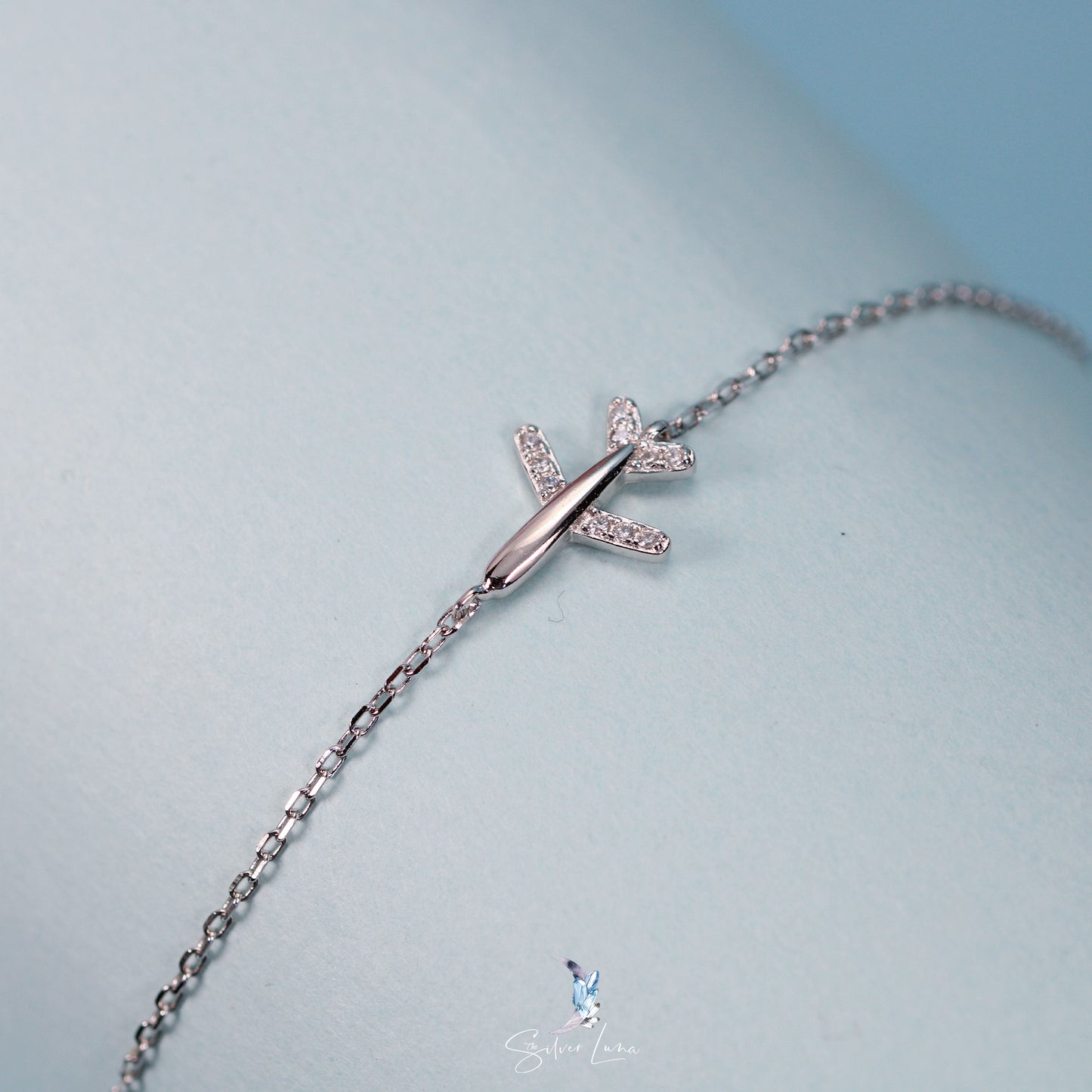 minimalist airplane silver bracelet