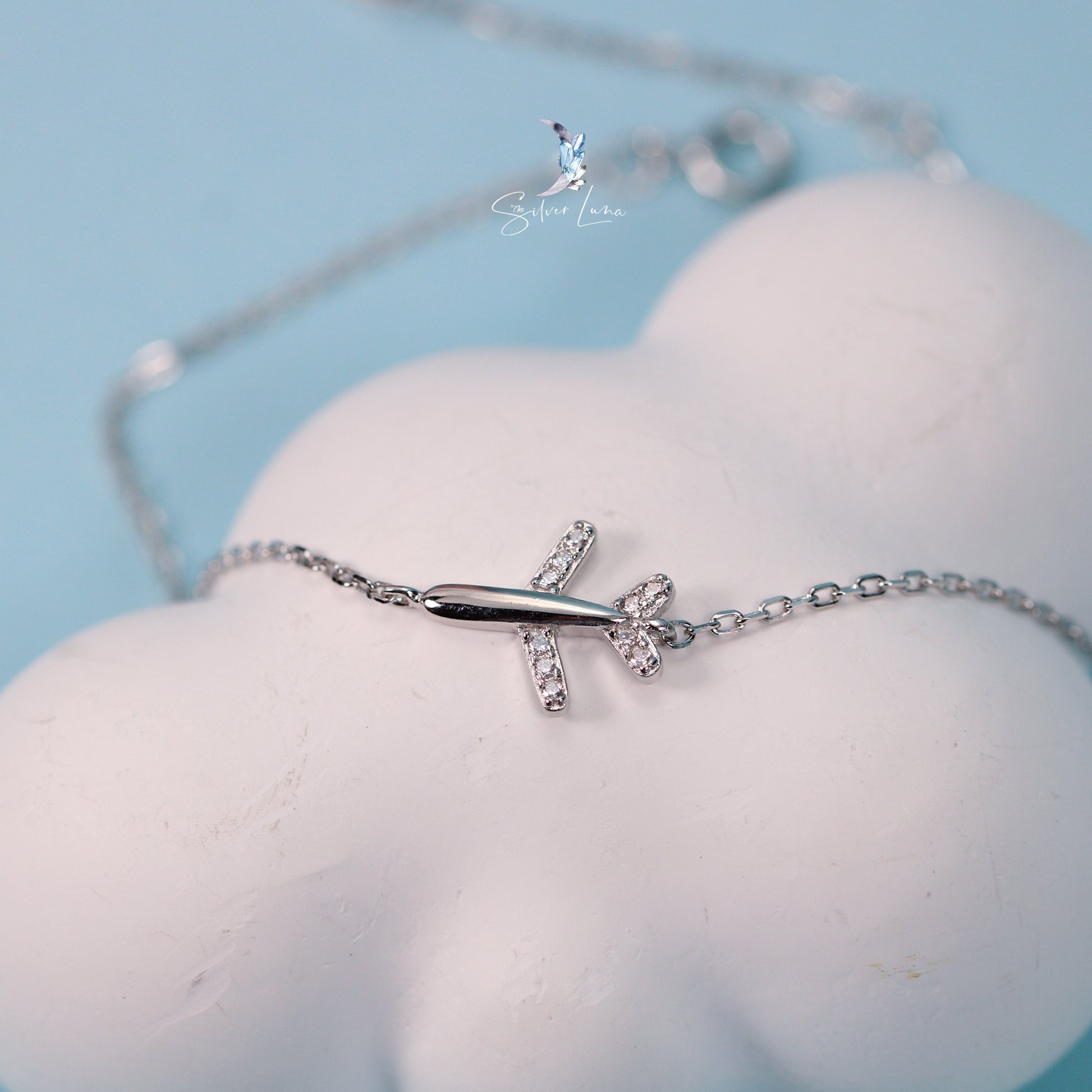 minimalist airplane silver bracelet