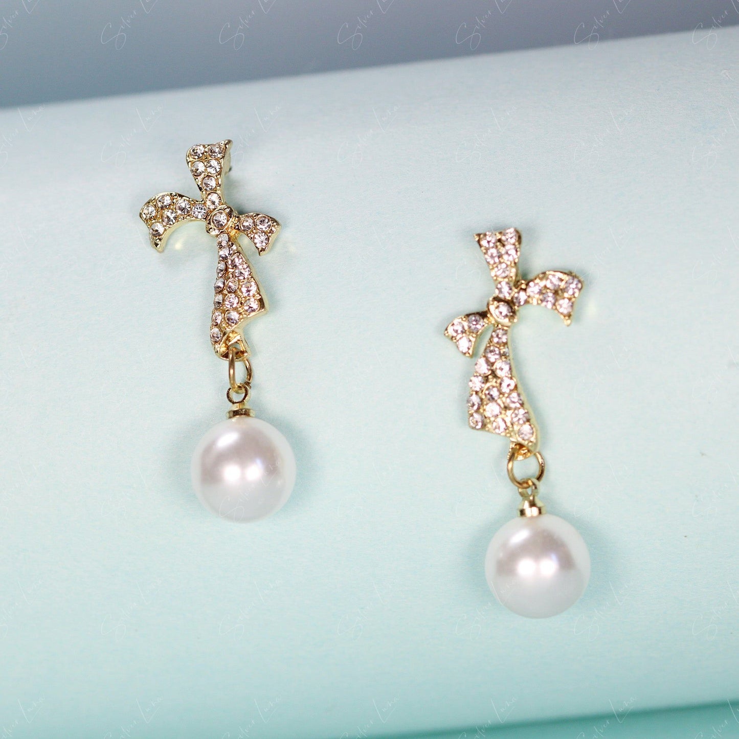 Crystal rhinestones bow tie with pearl drop fashion earrings