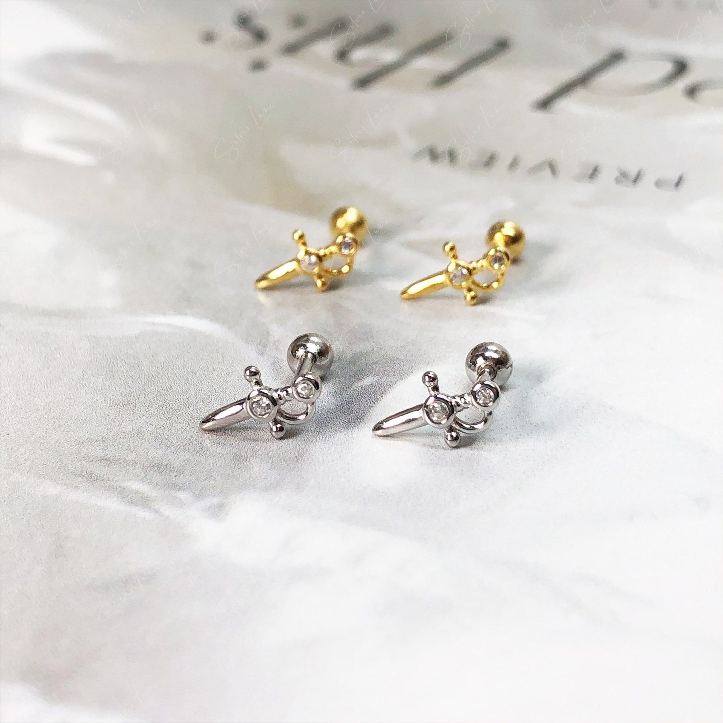 Little dagger screw back stud earrings