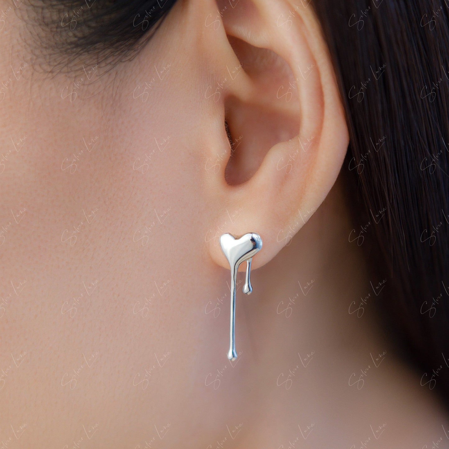 dripping heart stud earrings