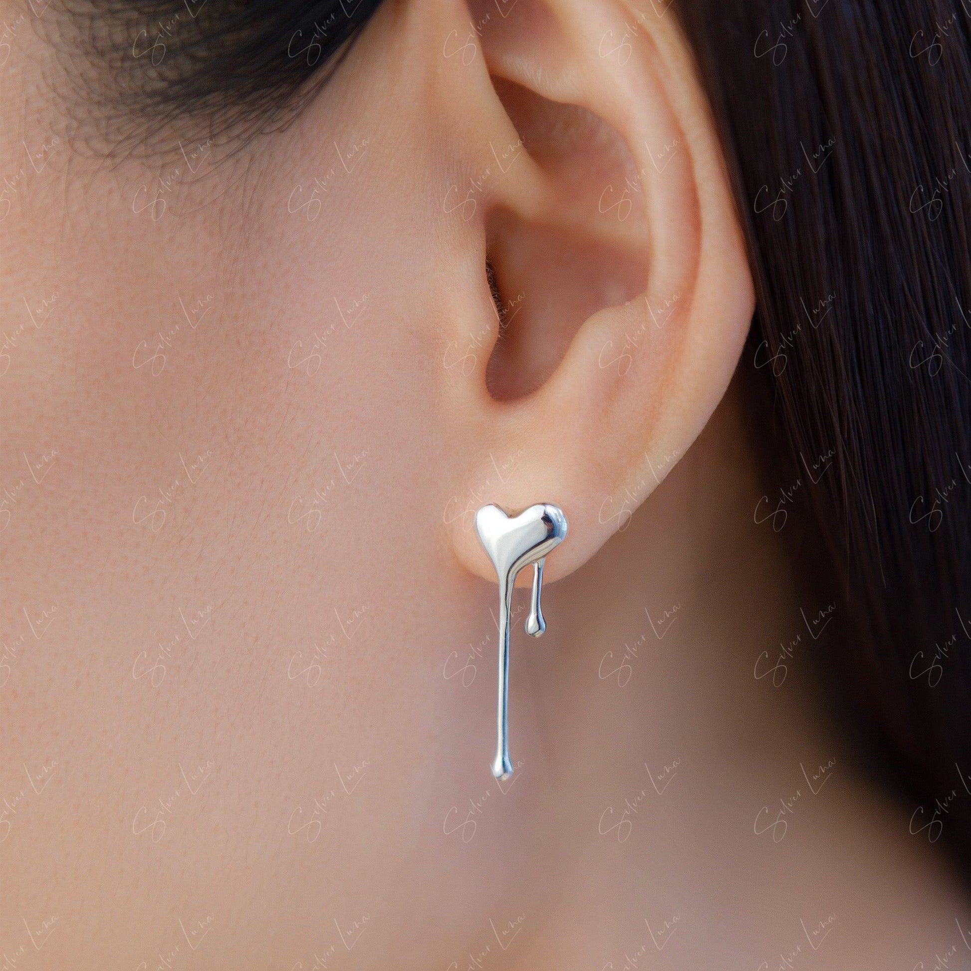 dripping heart stud earrings