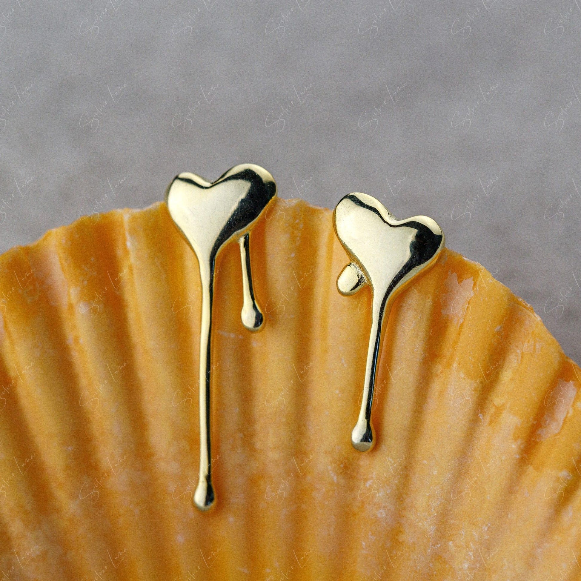melting heart sterling silver stud earrings
