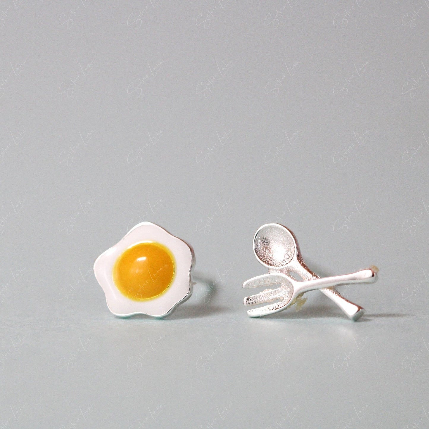 fried egg spoon and folk stud earrings