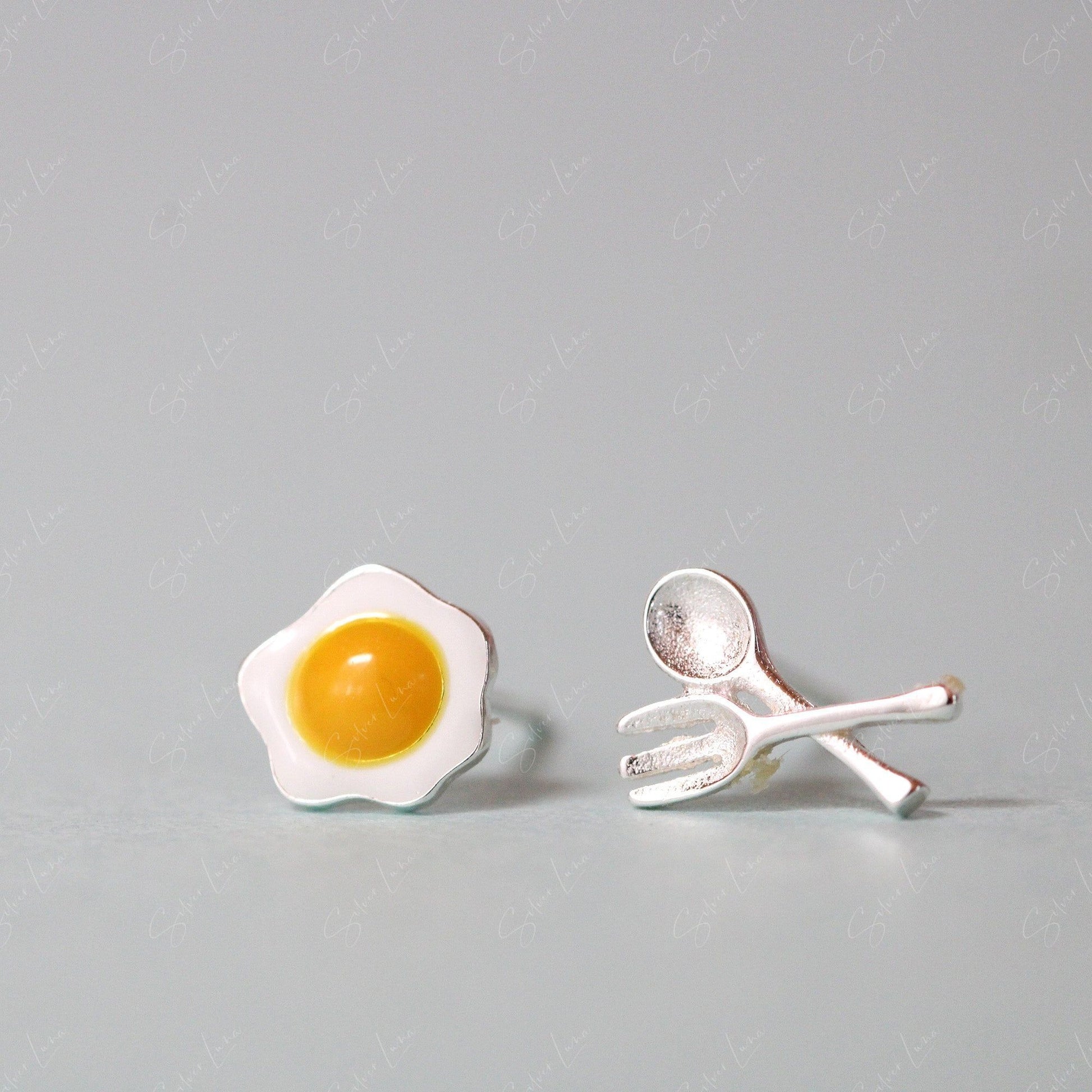 fried egg spoon and folk stud earrings