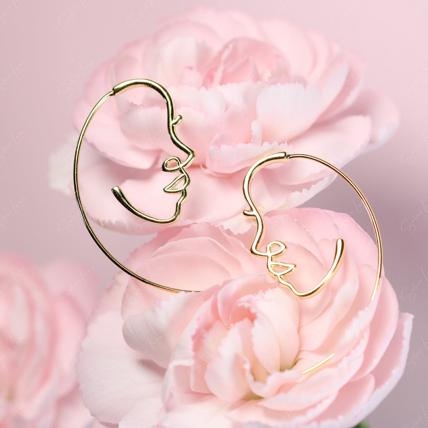 Abstract face sterling silver earrings