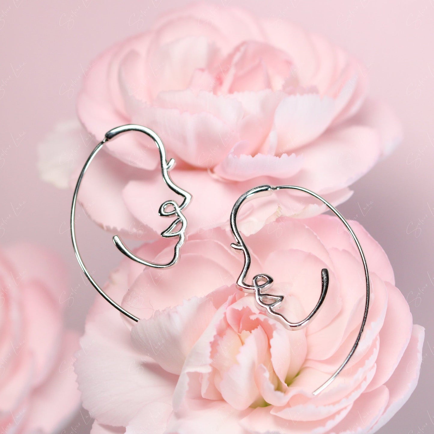 face silver earrings