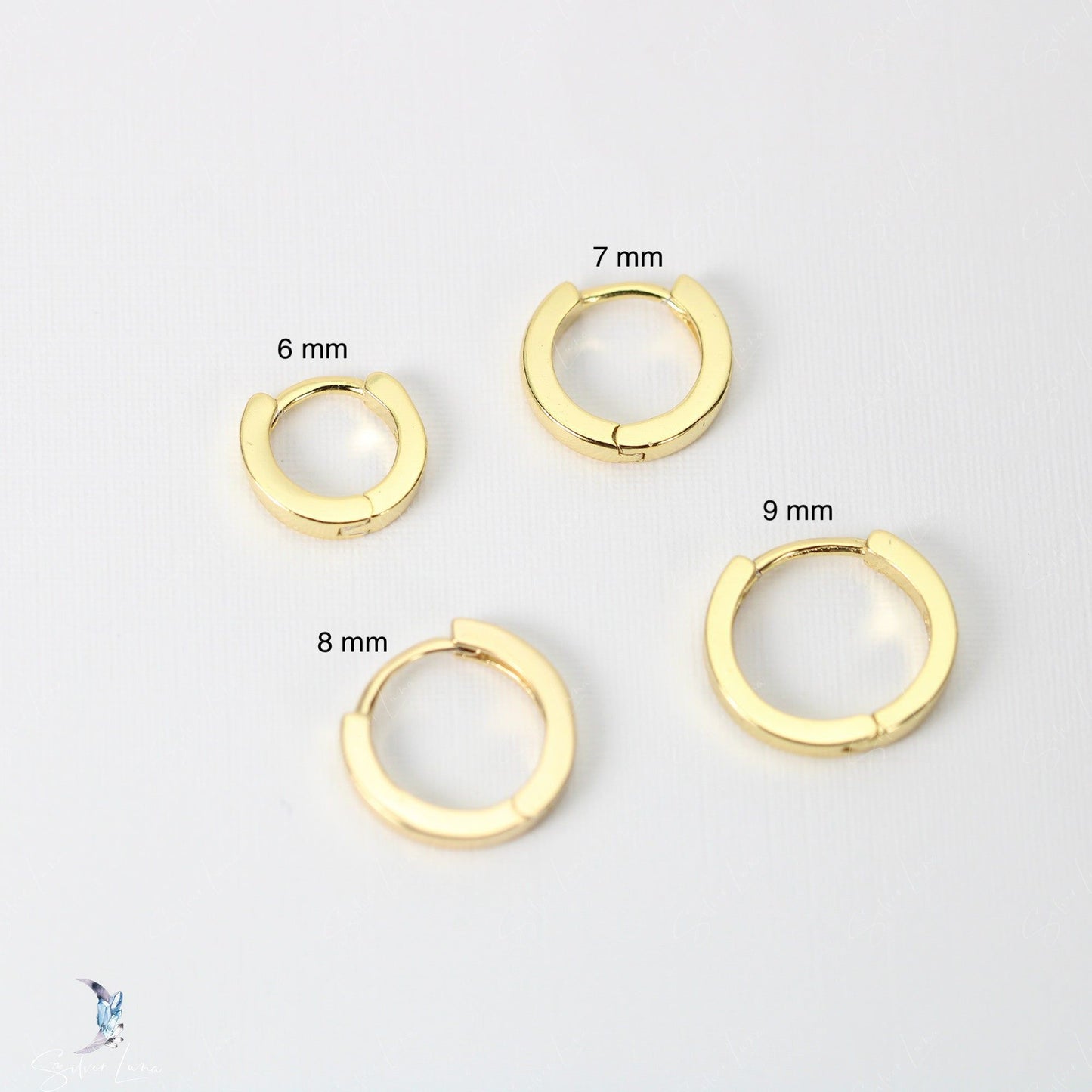 Simple minimalist silver hoop earrings in sterling silver