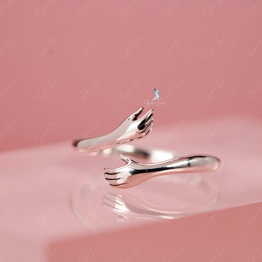 hugging hand adjustable ring