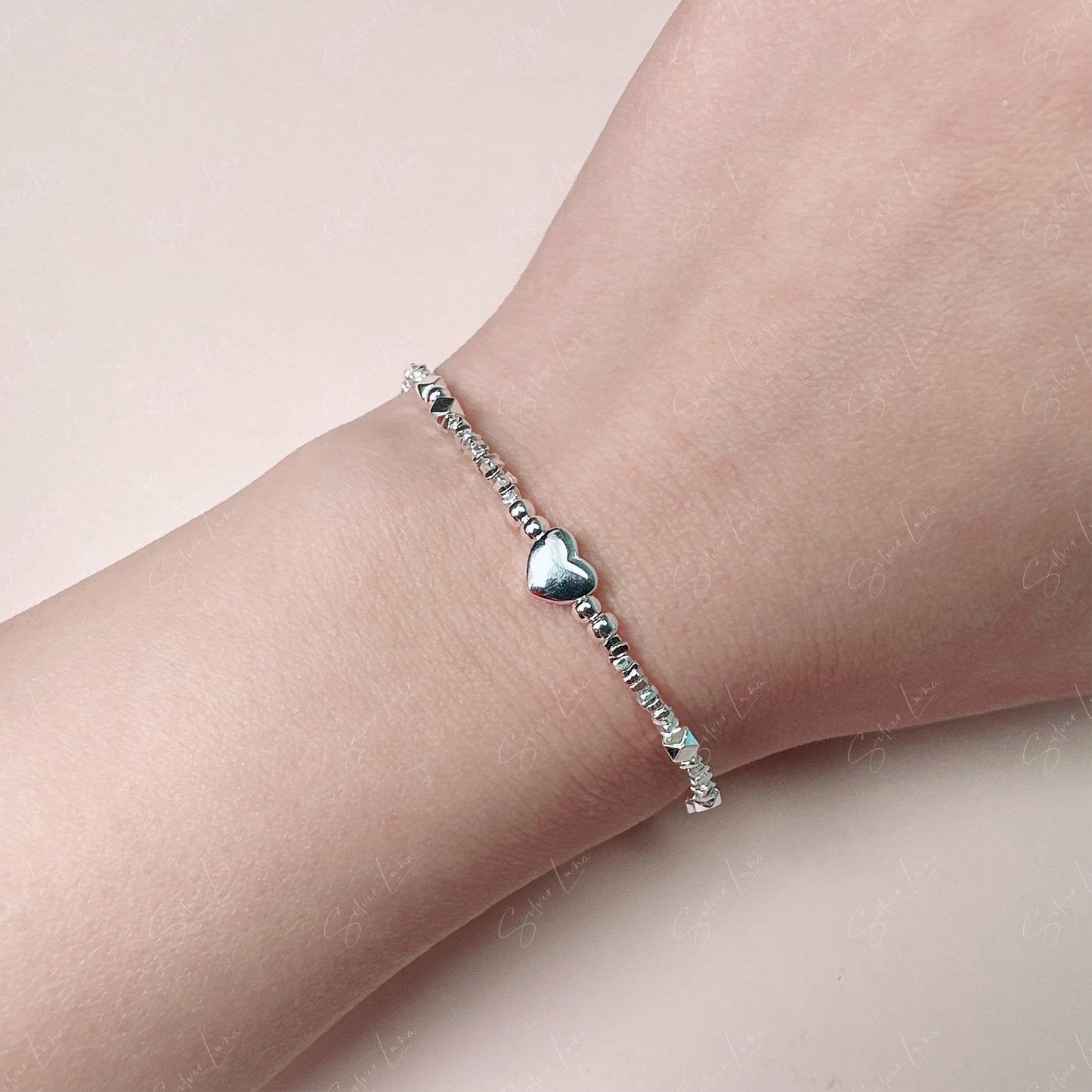 Ball beaded heart charm sterling silver bracelet