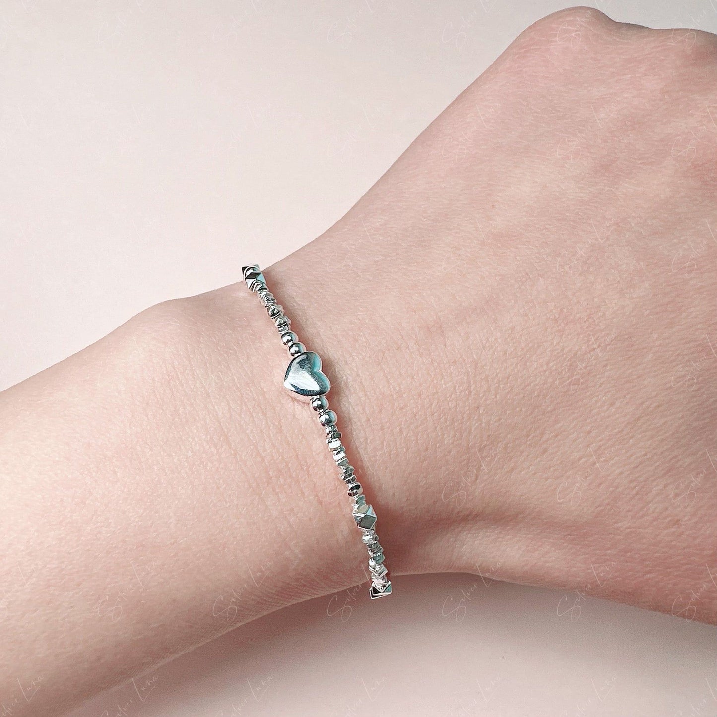 Ball beaded heart charm sterling silver bracelet