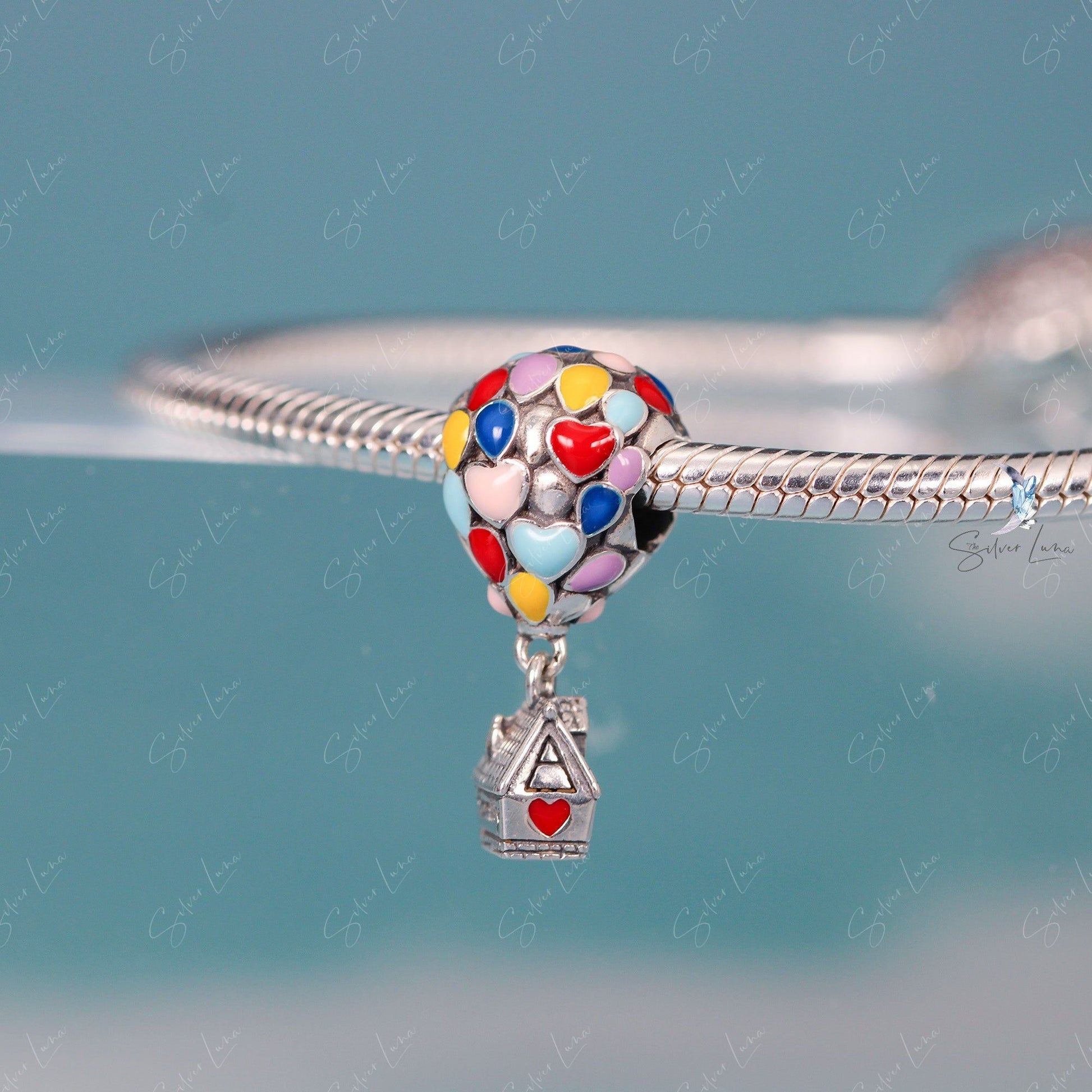 family house with love balloon charm