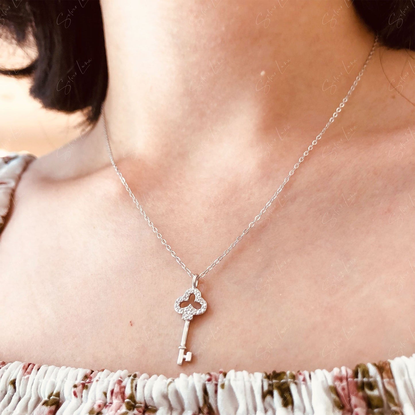 Dainty key pendant necklace in sterling silver