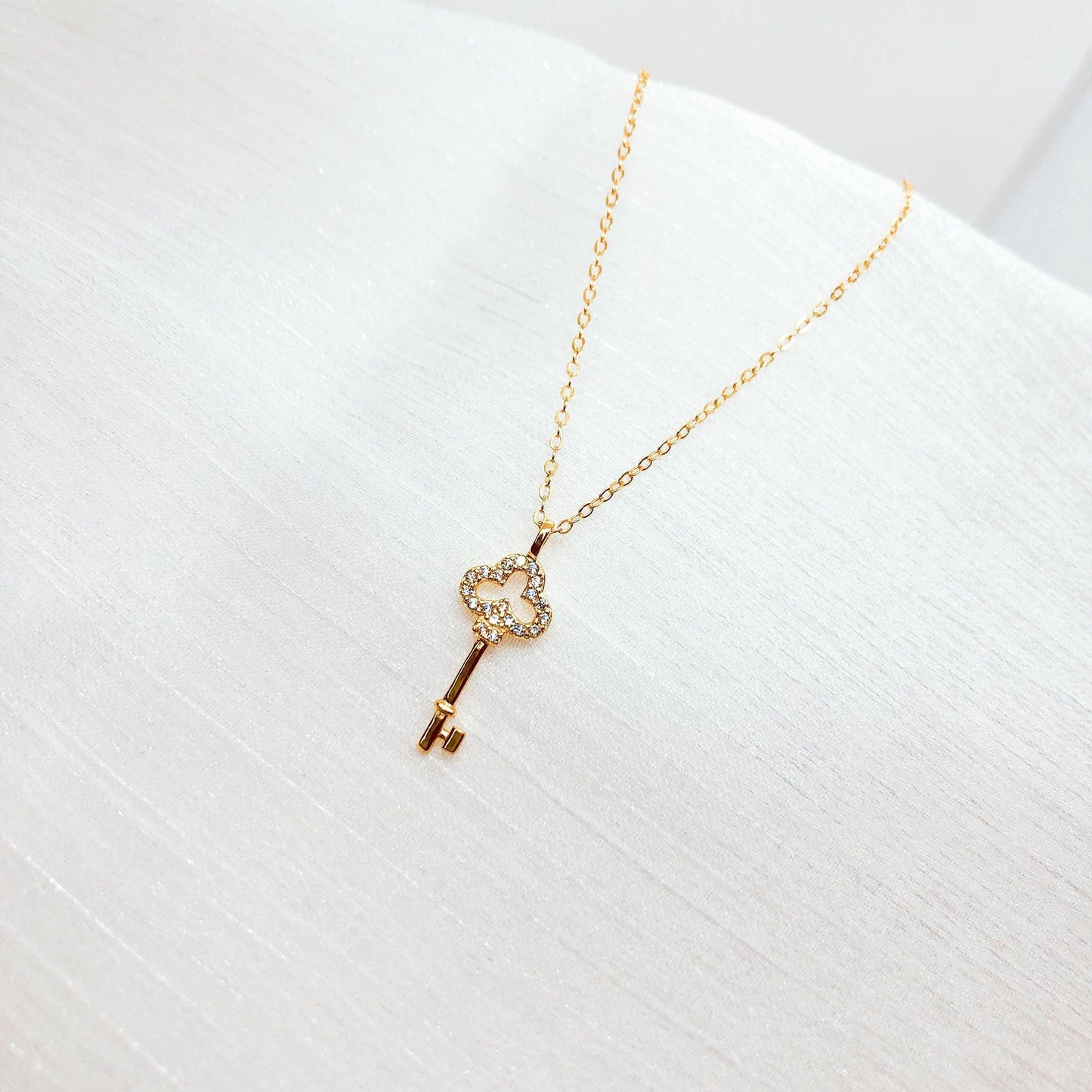 Dainty key pendant necklace in sterling silver
