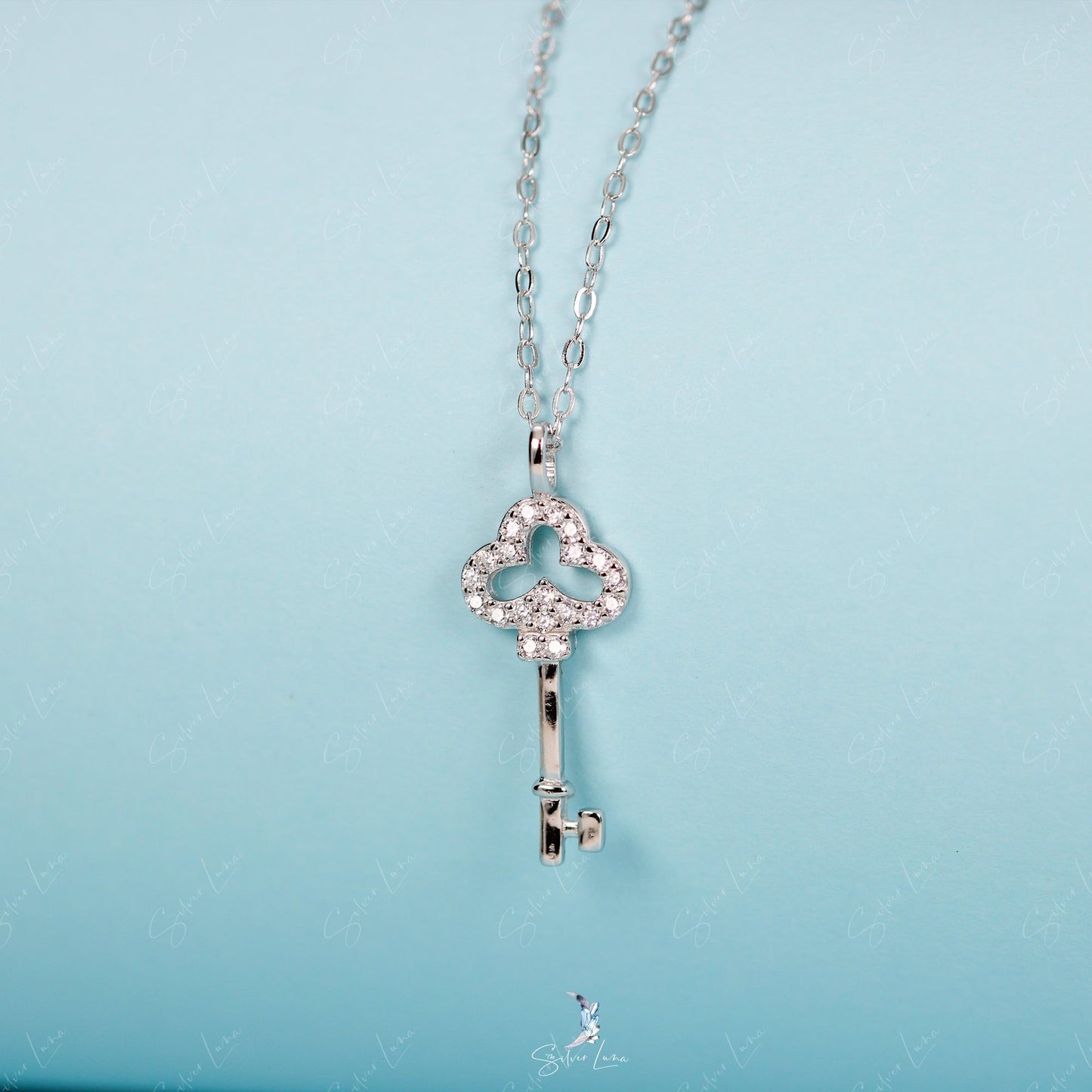 Dainty key pendant necklace in sterling silver