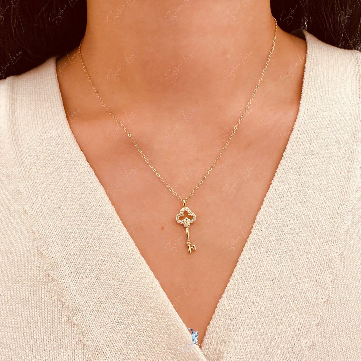 Dainty key pendant necklace in sterling silver