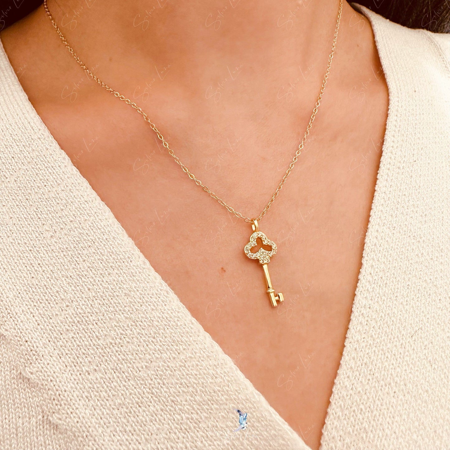 Dainty key pendant necklace in sterling silver