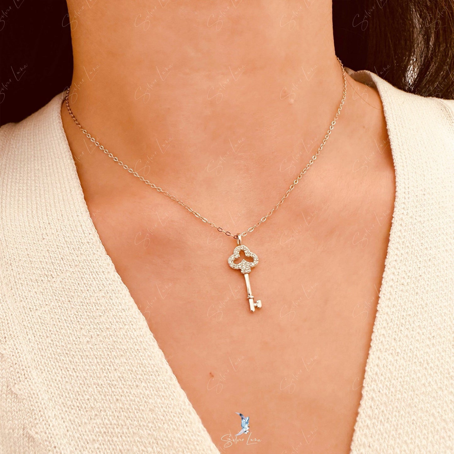 Dainty key pendant necklace in sterling silver