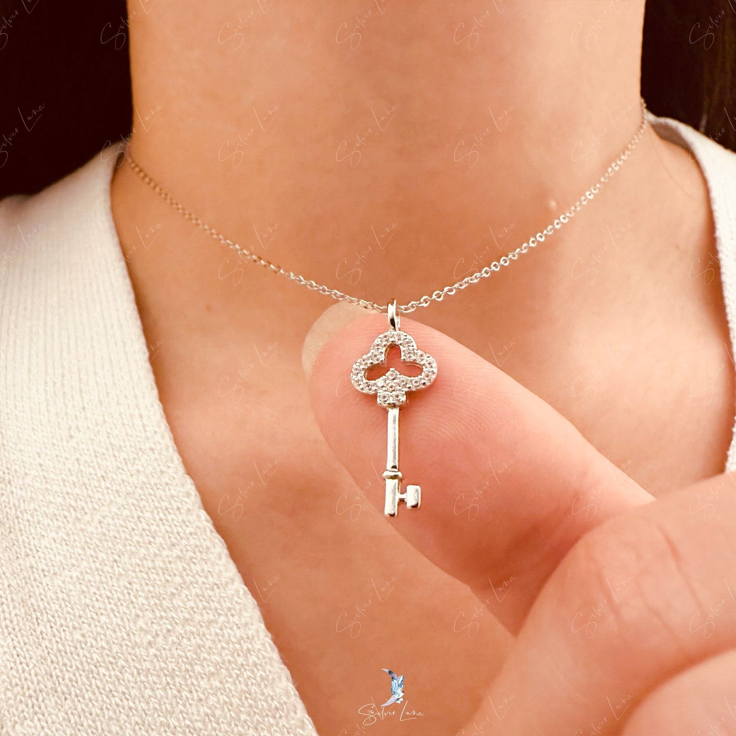 Dainty key pendant necklace in sterling silver