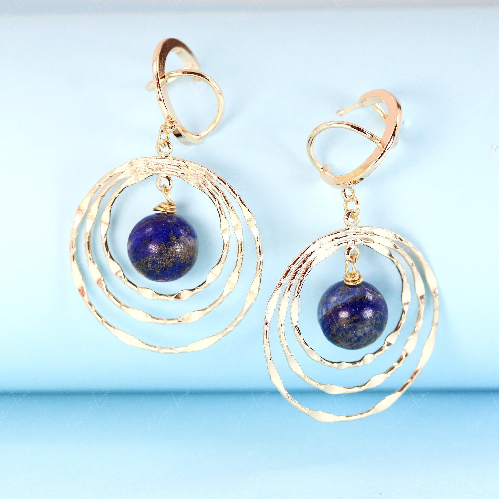 blue planet dangle drop earrings