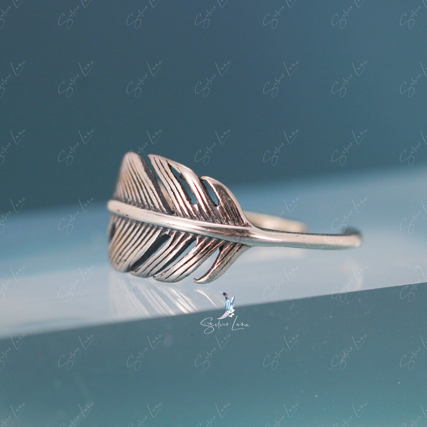 Feather wrap statement adjustable ring in sterling silver