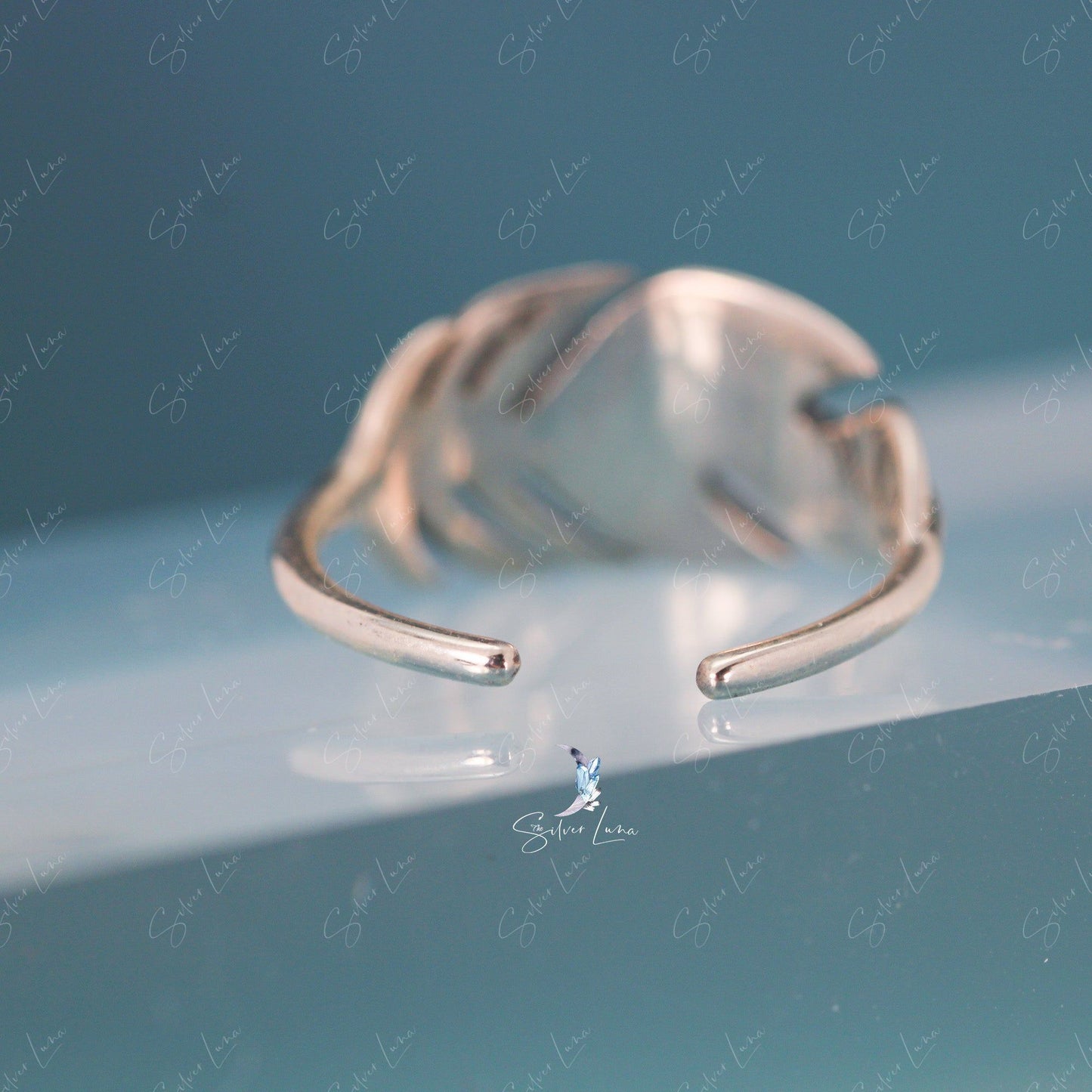 Feather wrap statement adjustable ring in sterling silver