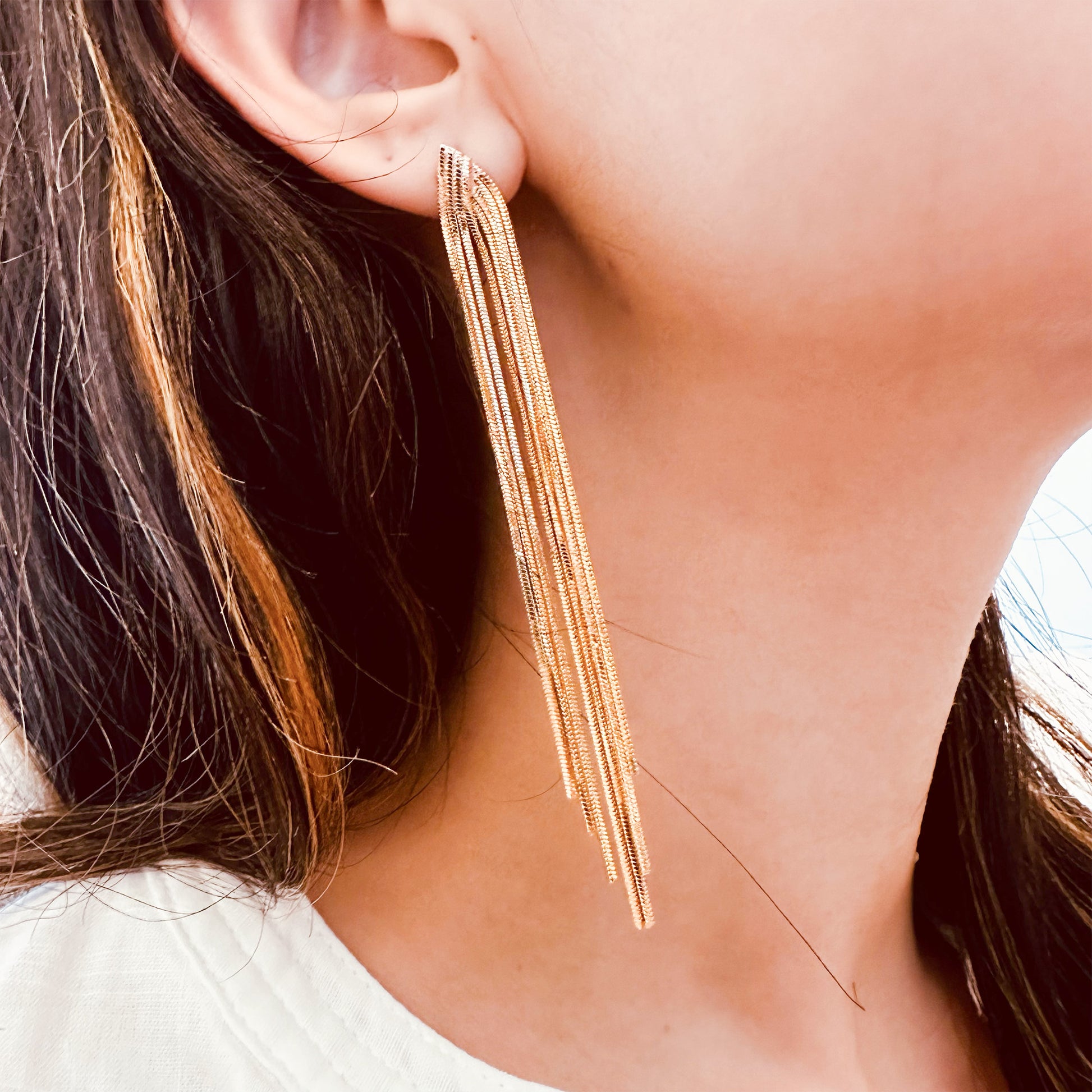 gold metal tassel long drop earrings