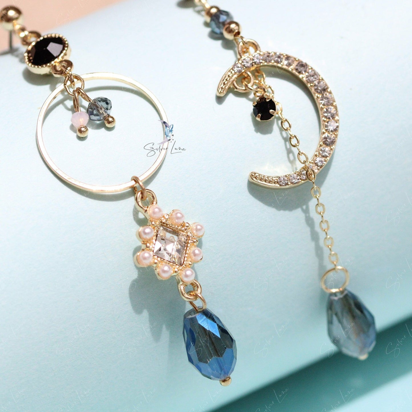 Long shiny crystal moon dangle drop earrings