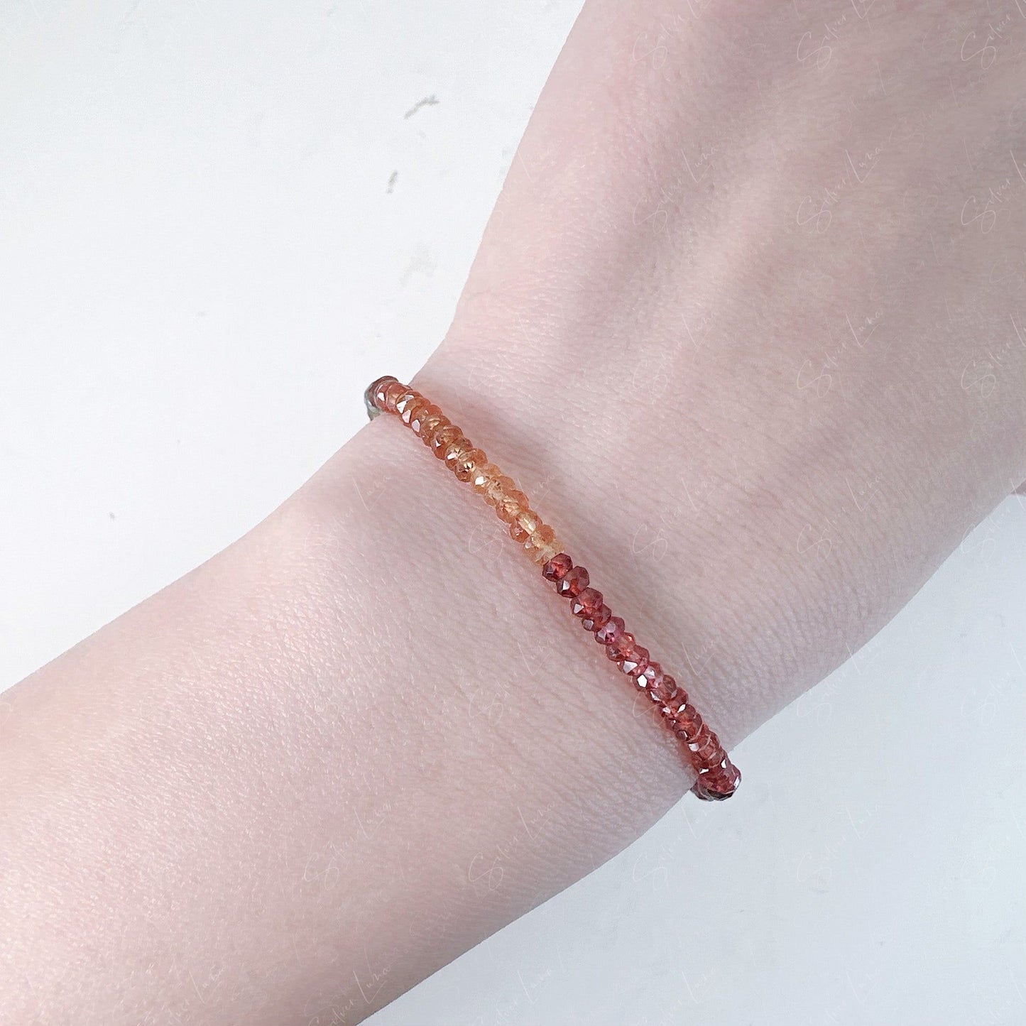 Rainbow color faceted garnet gemstone sterling silver bracelet