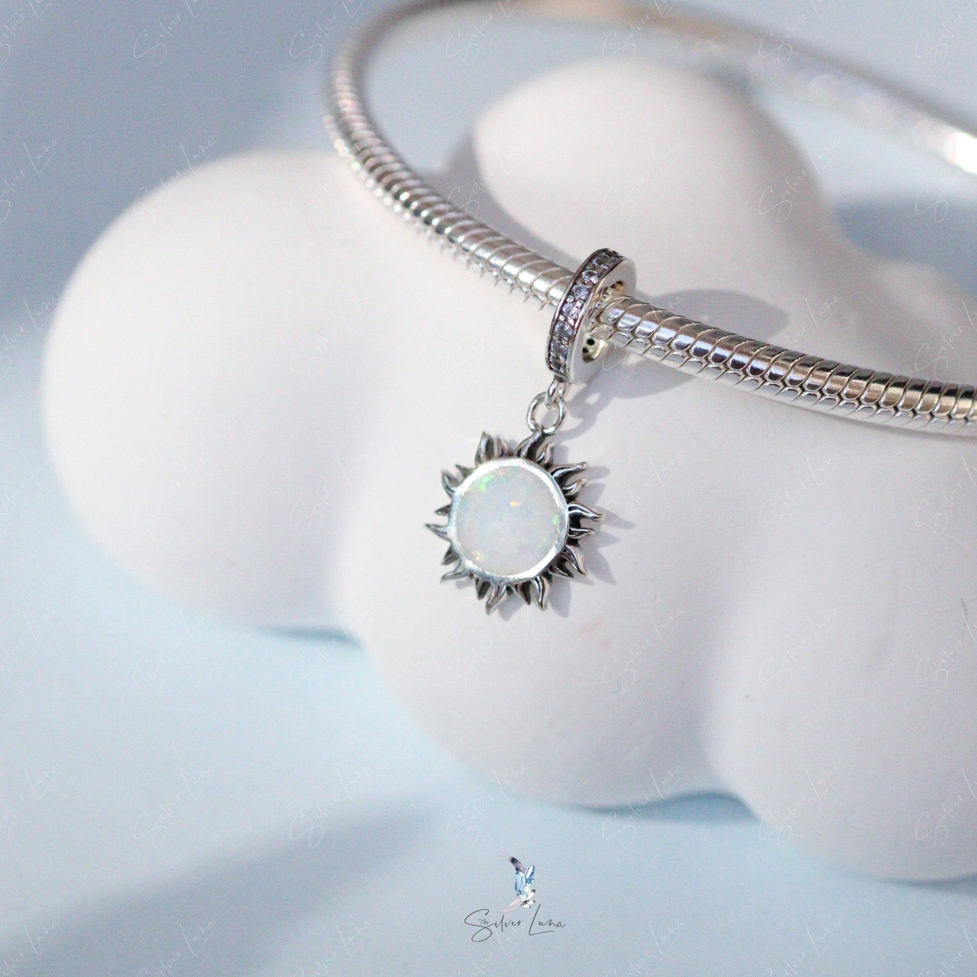 opal sun silver pendant