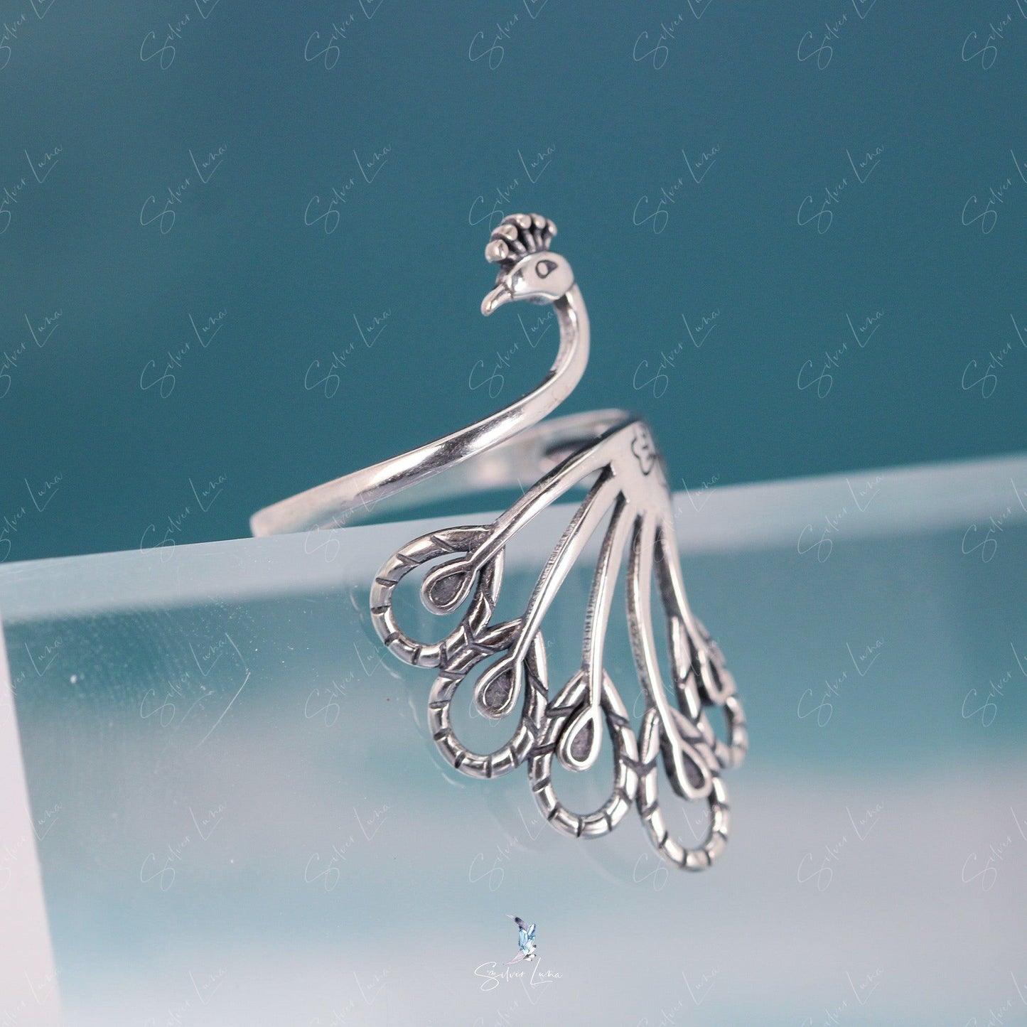 Phoenix Peacock sterling silver adjustable ring