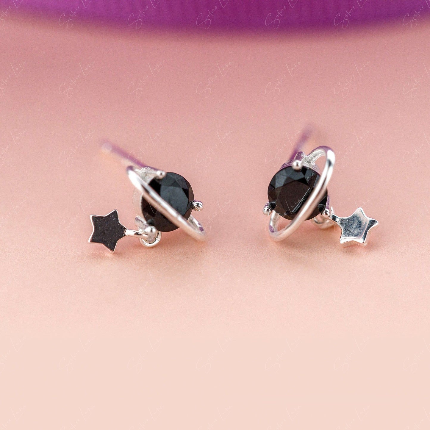 black planet stud earrings