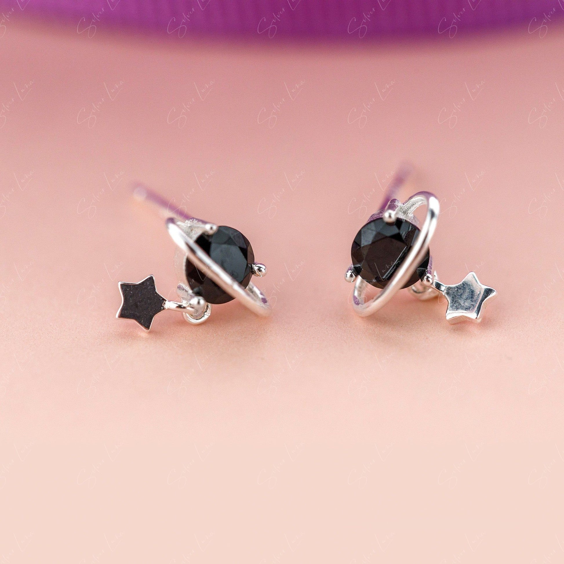 black planet stud earrings