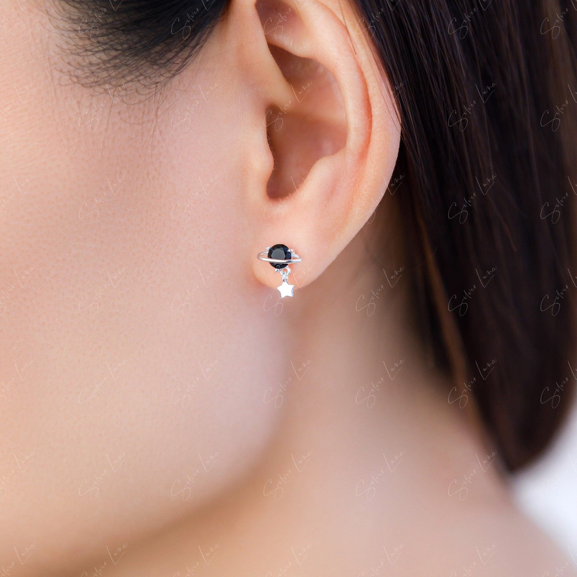 black planet stud earrings
