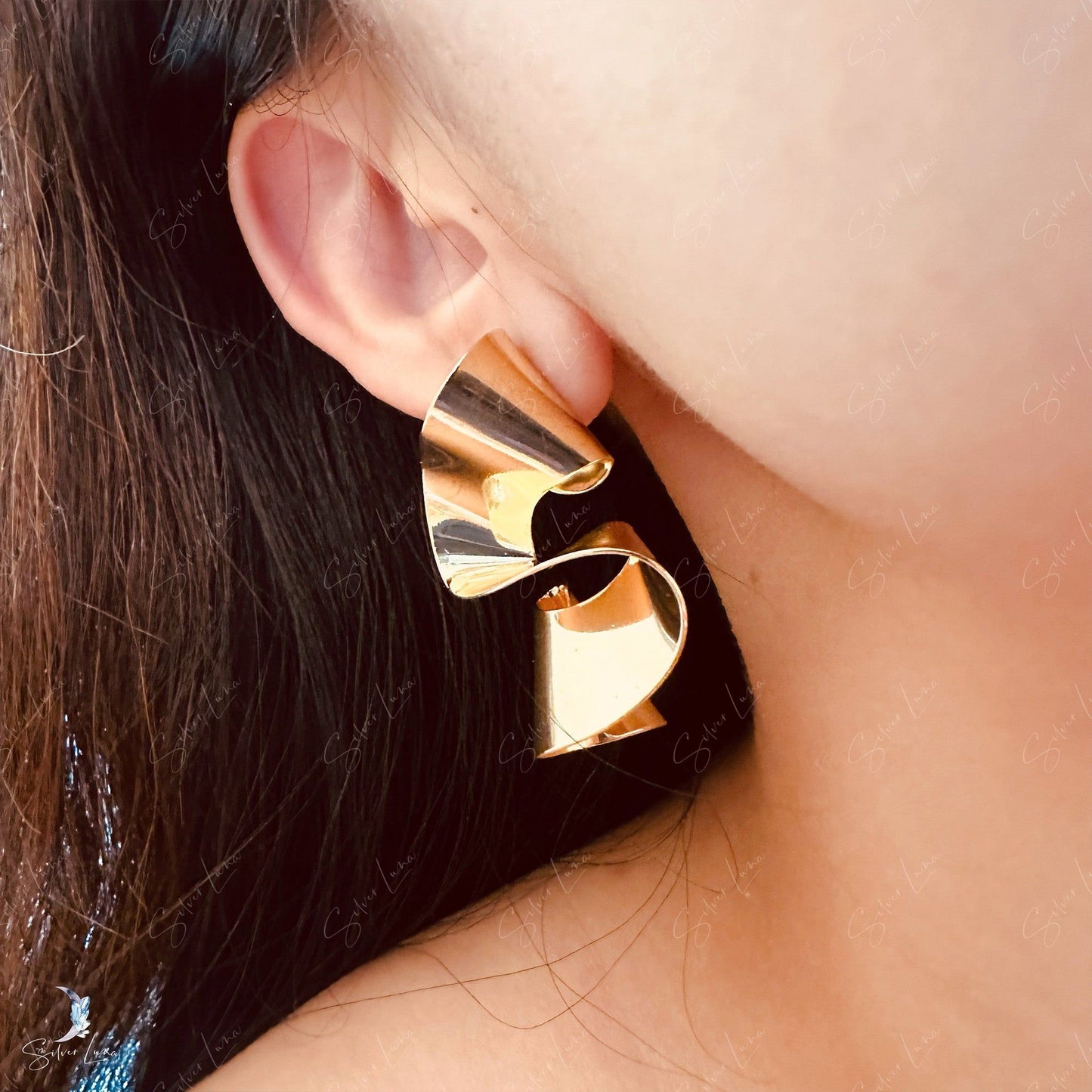 Pencil shave wave statement earrings